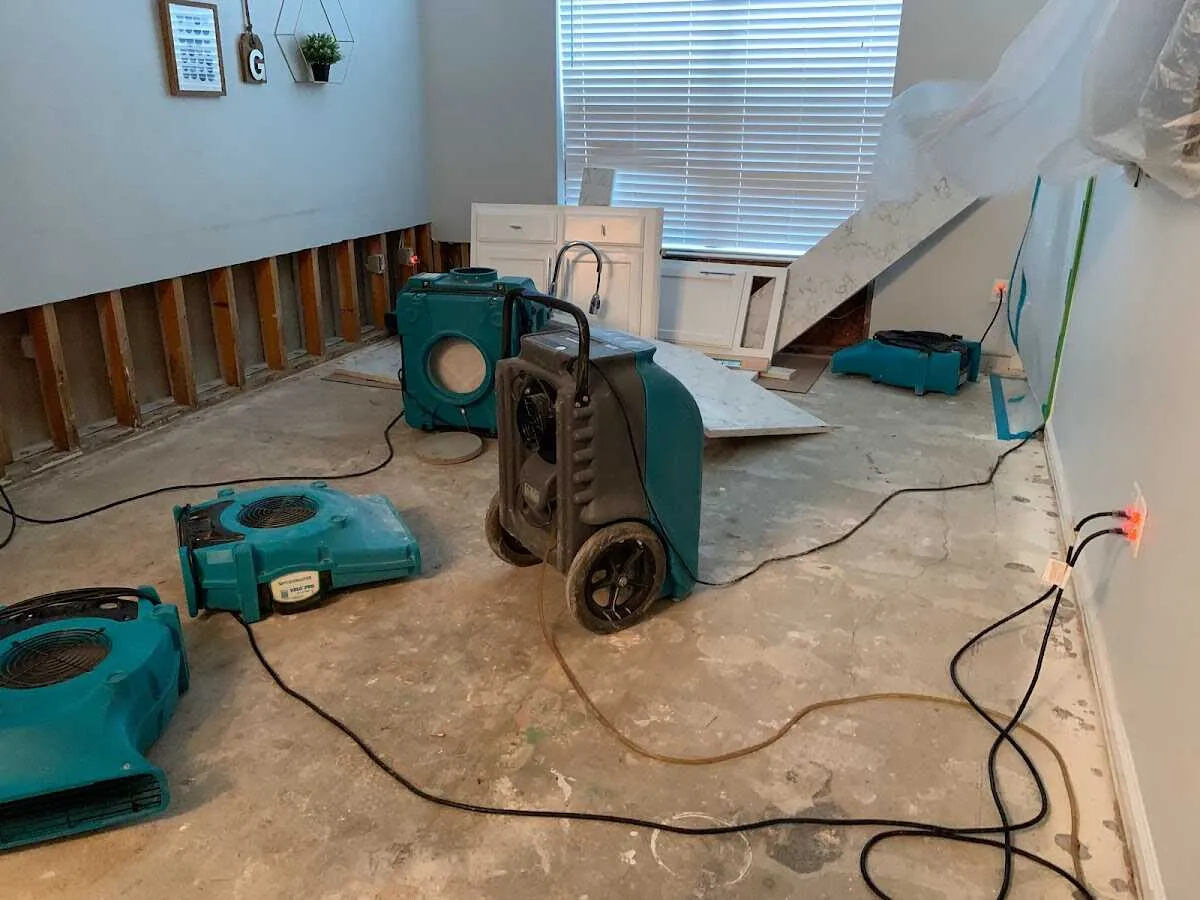 Dehumidifier in flood-cut room for Water Damage Restoration in Dalton